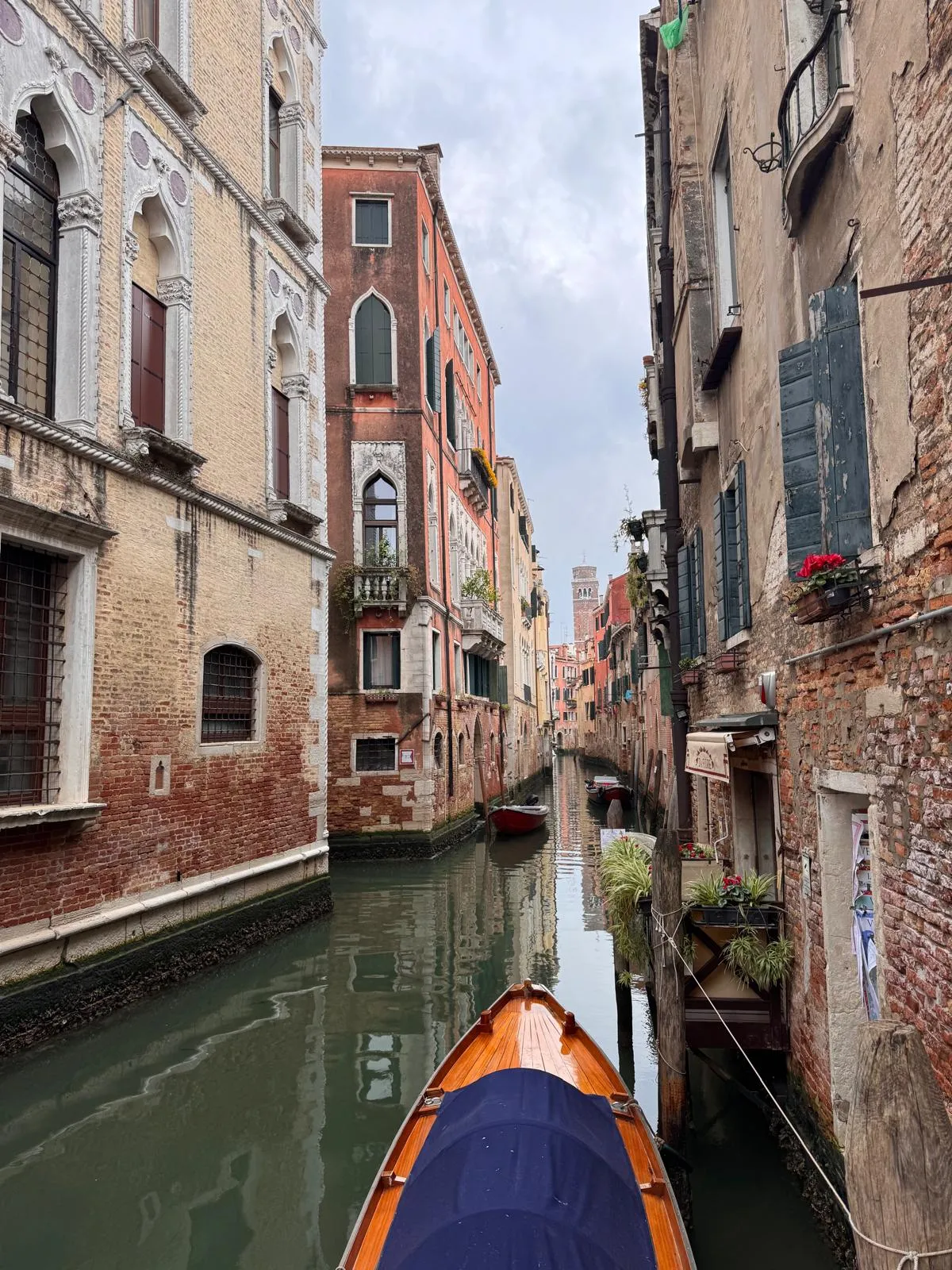 Picturesque canal view in Venezia Italy with gondola and historic buildings